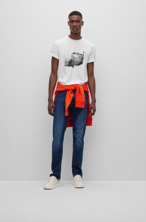 Jeans Slim Fit Em Denim Azul Escuro Com Movimento Supremo