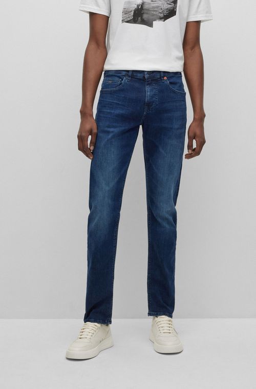 Jeans Slim Fit Em Denim Azul Escuro Com Movimento Supremo