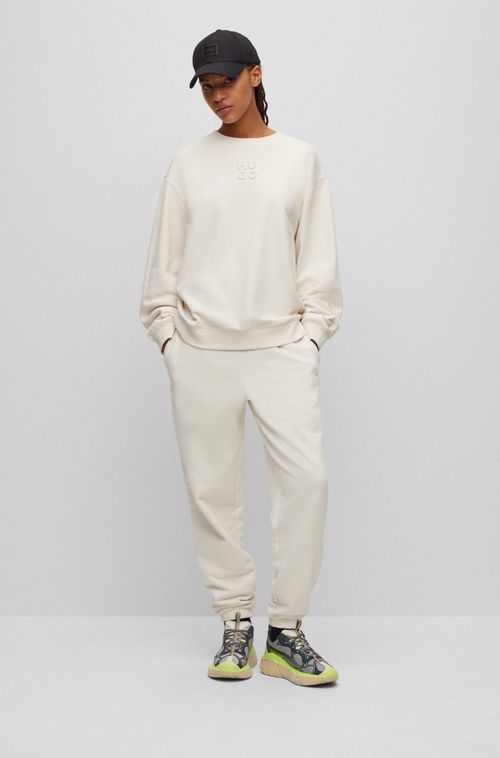 Calça Tracksuit Branca De Ajuste Descontraído Com Logo Estilizado Em Relevo