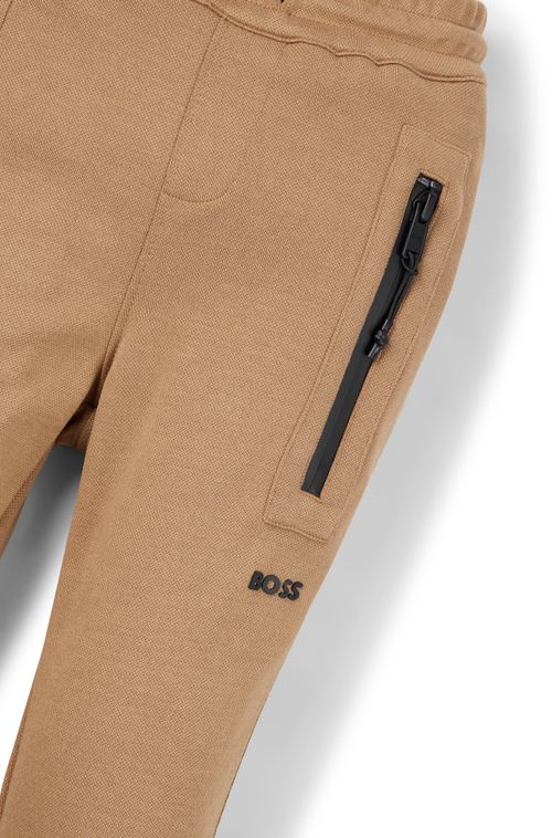 Calças Tracksuit Infantil Em Piqué Elástico Com Bolso De Patch