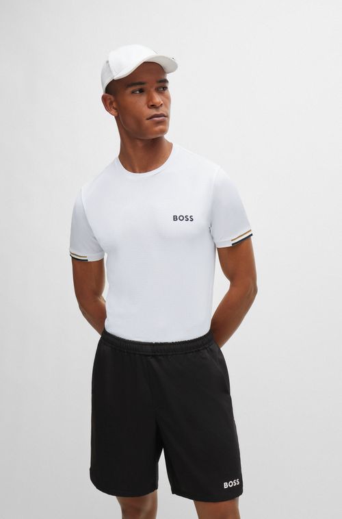 Camiseta De Malha Estruturada Com Arte Em Listras Características