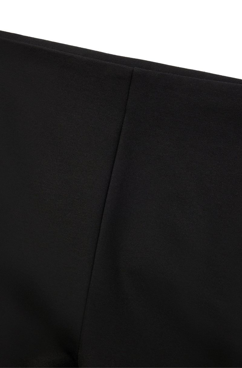 Calça De Corte Relaxado Em Tecido Stretch Com Perna Flare