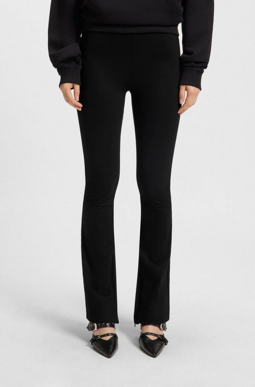 Calça De Corte Relaxado Em Tecido Stretch Com Perna Flare