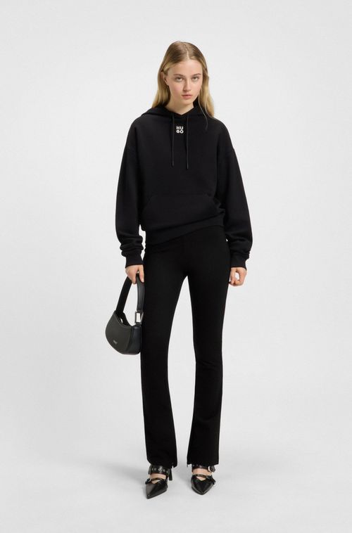 Calça De Corte Relaxado Em Tecido Stretch Com Perna Flare